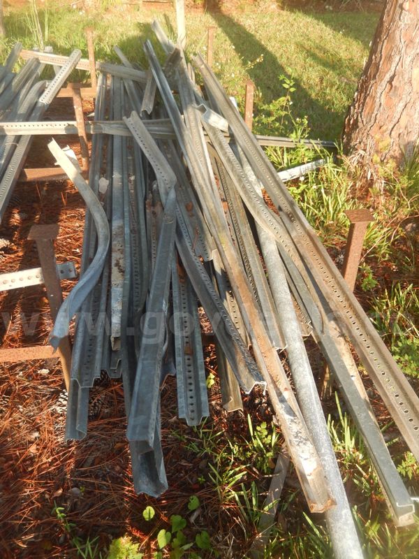 USED (25) SQUARE METAL SIGN POSTS RANGING FROM 56" L TO 144" L