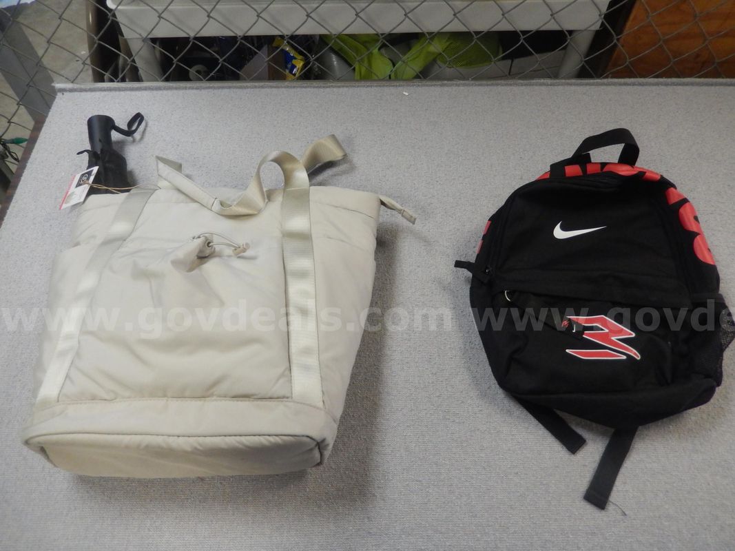 Used (1) Nike Small Backpack, (1) Black Umbrella, (1) Life Style, Beige, Sport Tote, (1) Pair White, Crane Ladies Shoes