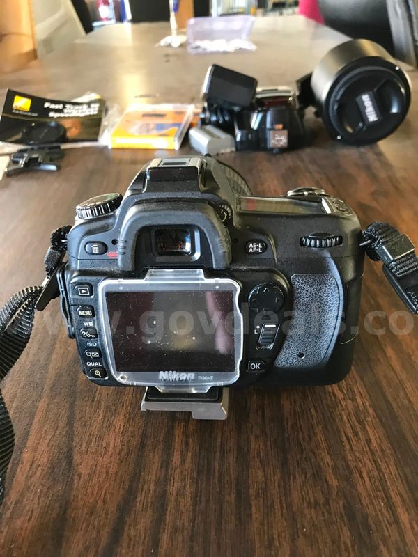 NIKON D80 CAMERA AND ACCESSORIES IN A BOX.