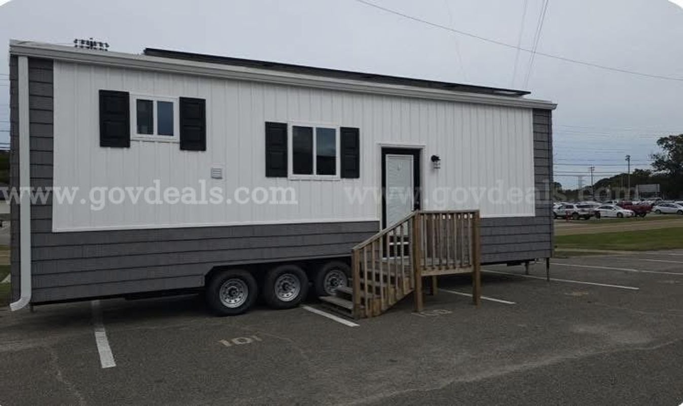 Solar Powered Tiny Home 8 feet x 32 feet - 256 sq ft of living area - Triple-Axle Trailer