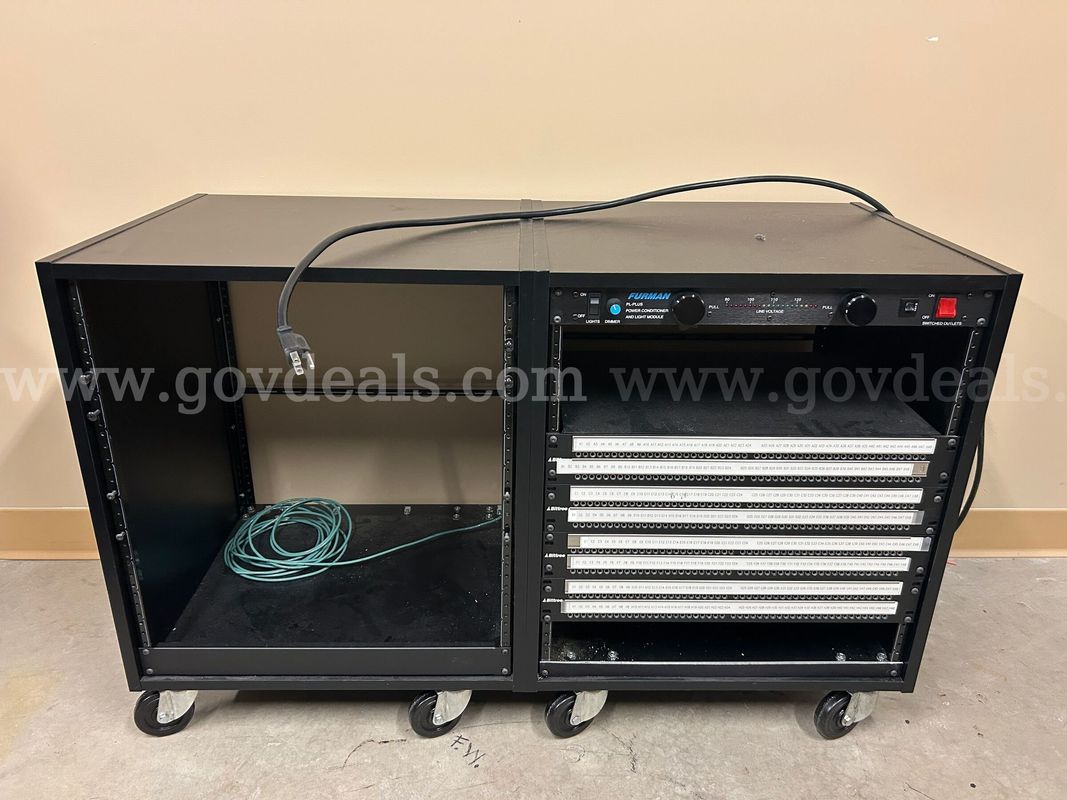 Two sided (12x2) studio audio rack with 4 patch bays