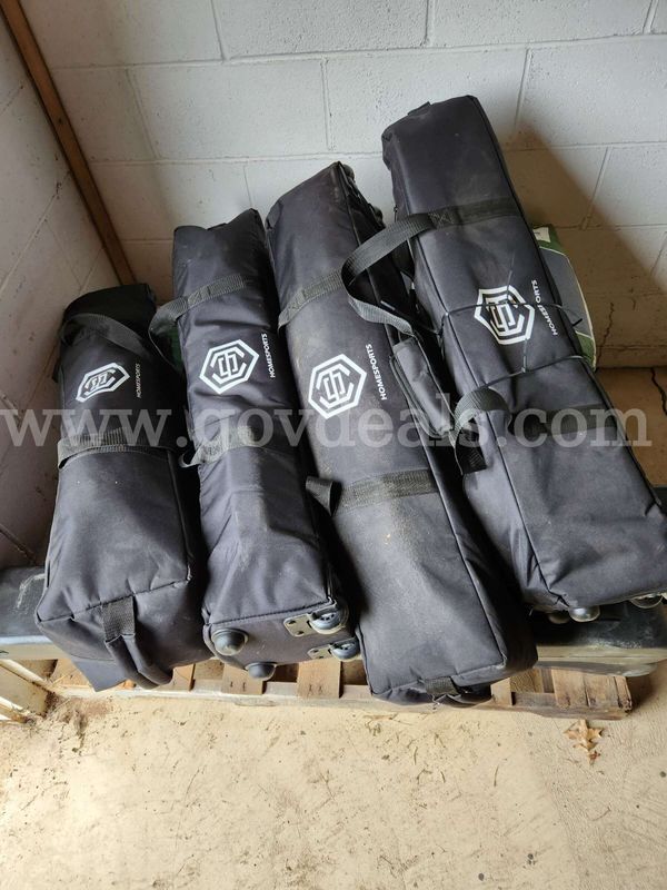 4 used portable pickle ball nets and carrying cases