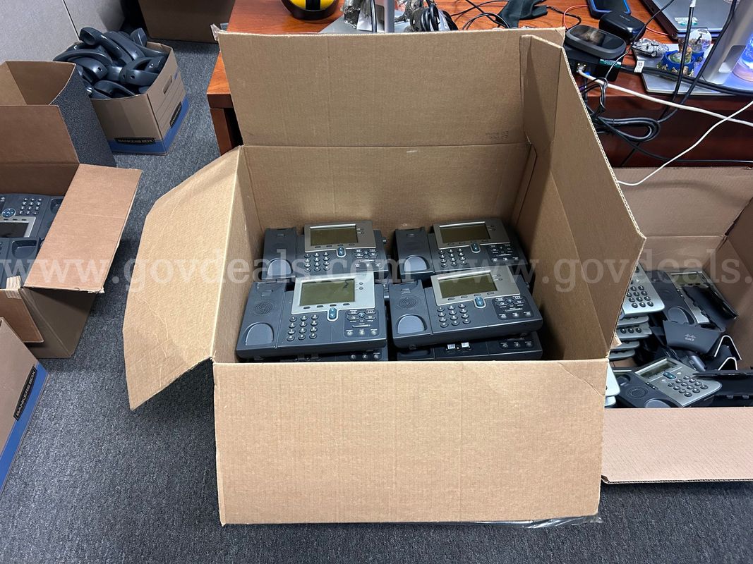 One (1) LOT of 70 Cisco IP Phones various models' w/ Handsets & Cables.