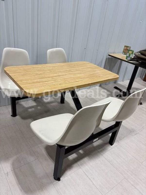 Tables with swivel chairs