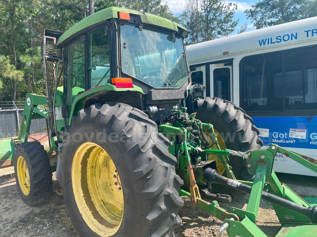 2002 John Deere Tractor (4WD) with Enclosed Cab