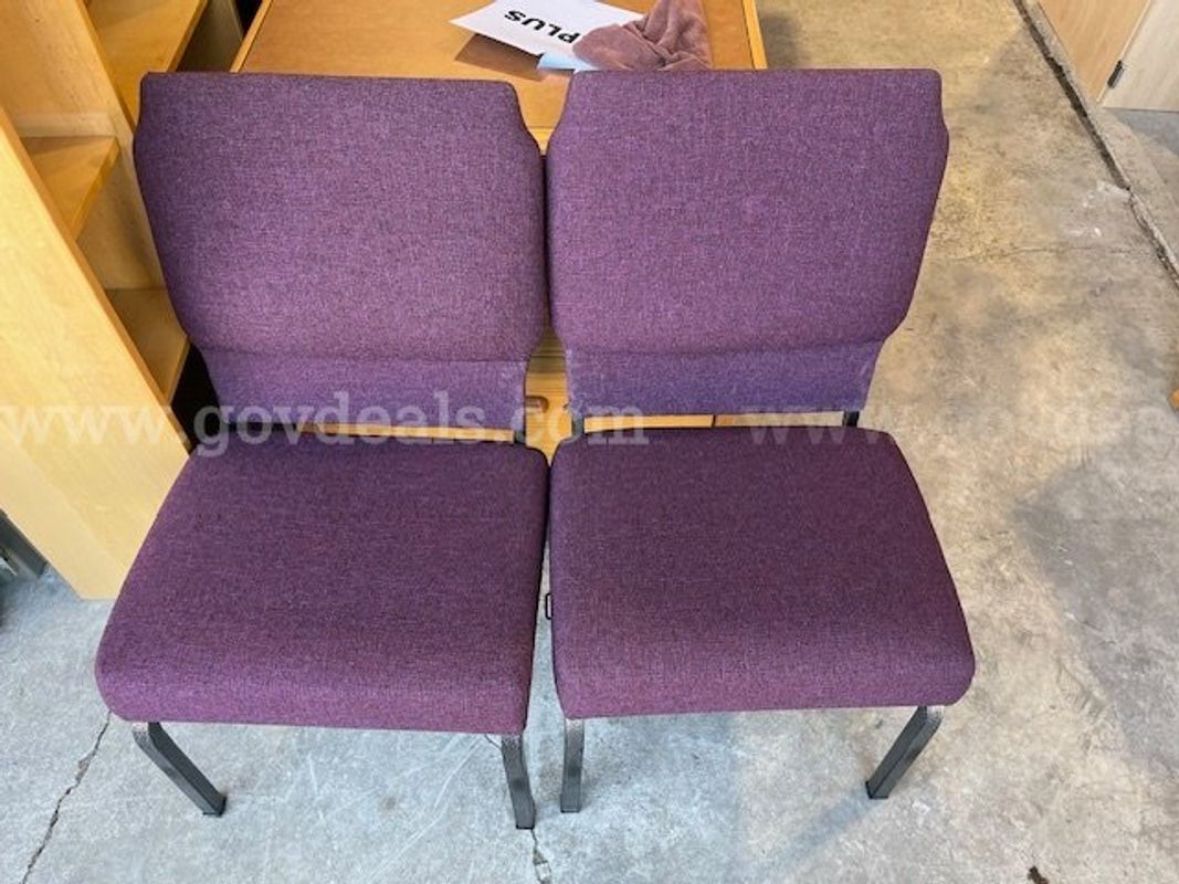 Two purple chairs with metal legs