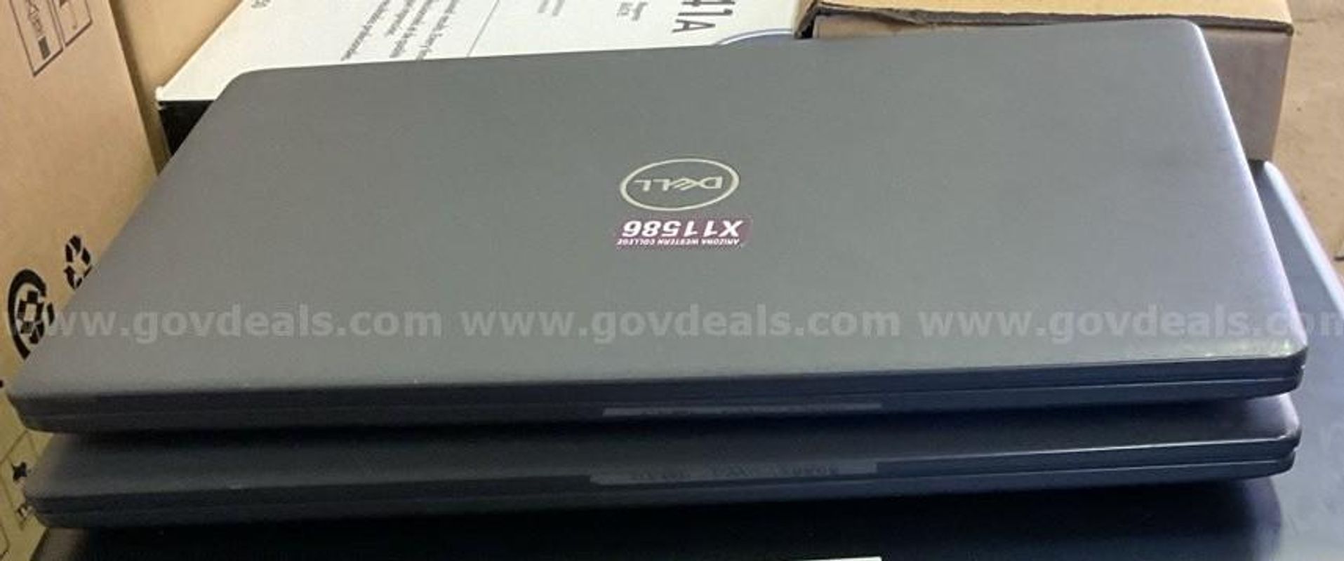 2 Dell Latitude laptop computers