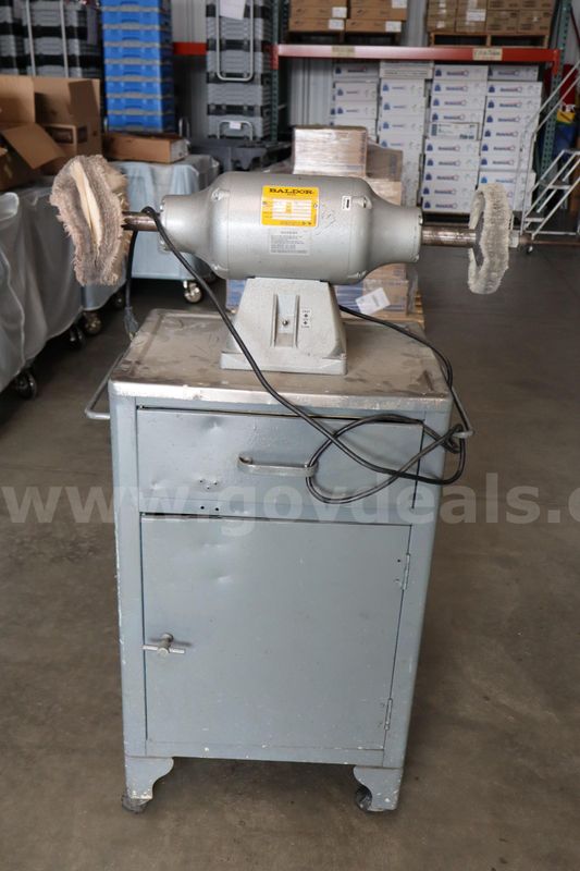 Baldor Buffer / Polisher on Metal Base Cabinet