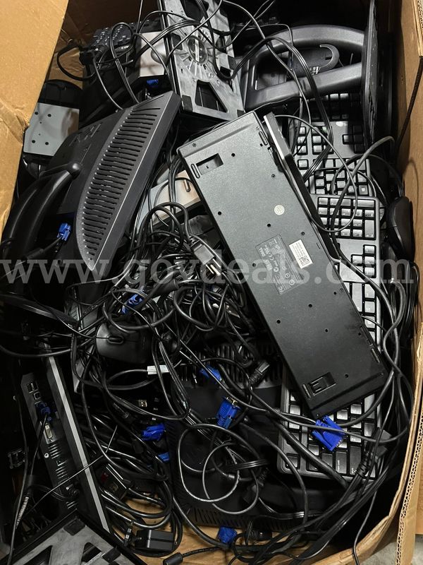 Lot of miscellaneous tech items including Dell monitors, keyboards, some cables.