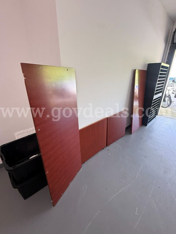 four wooden parts for a desk