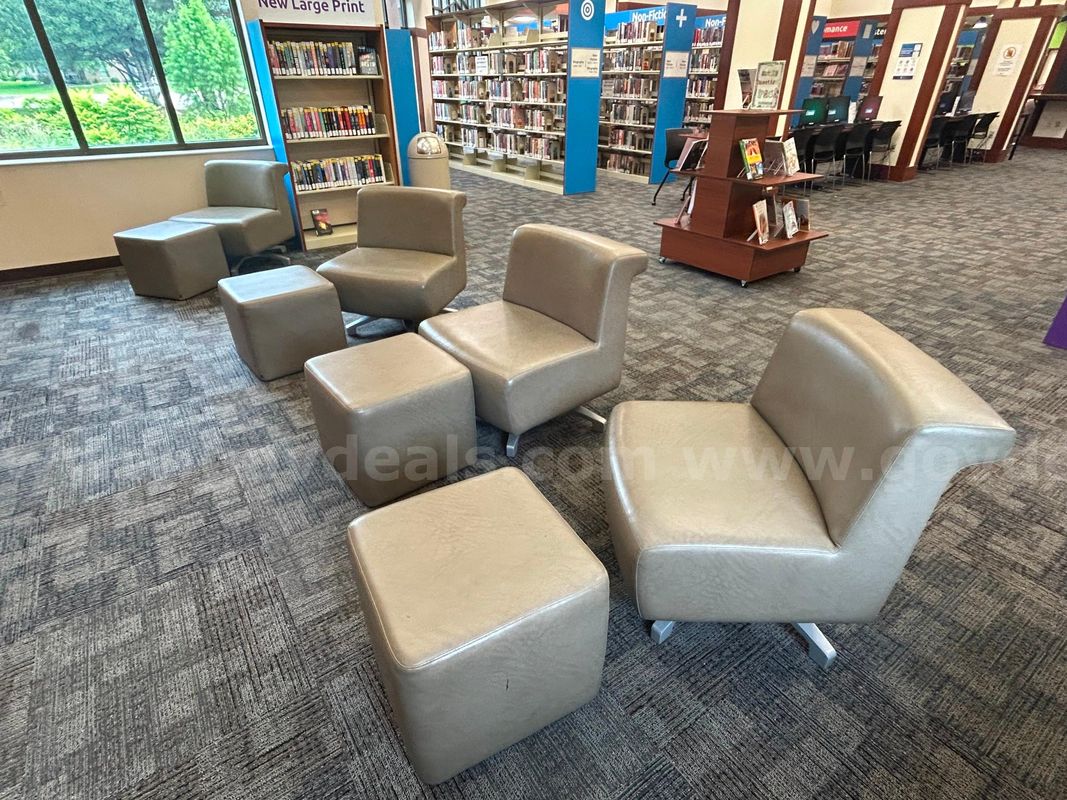 Four Vinyl Lounge Chairs plus Ottomans