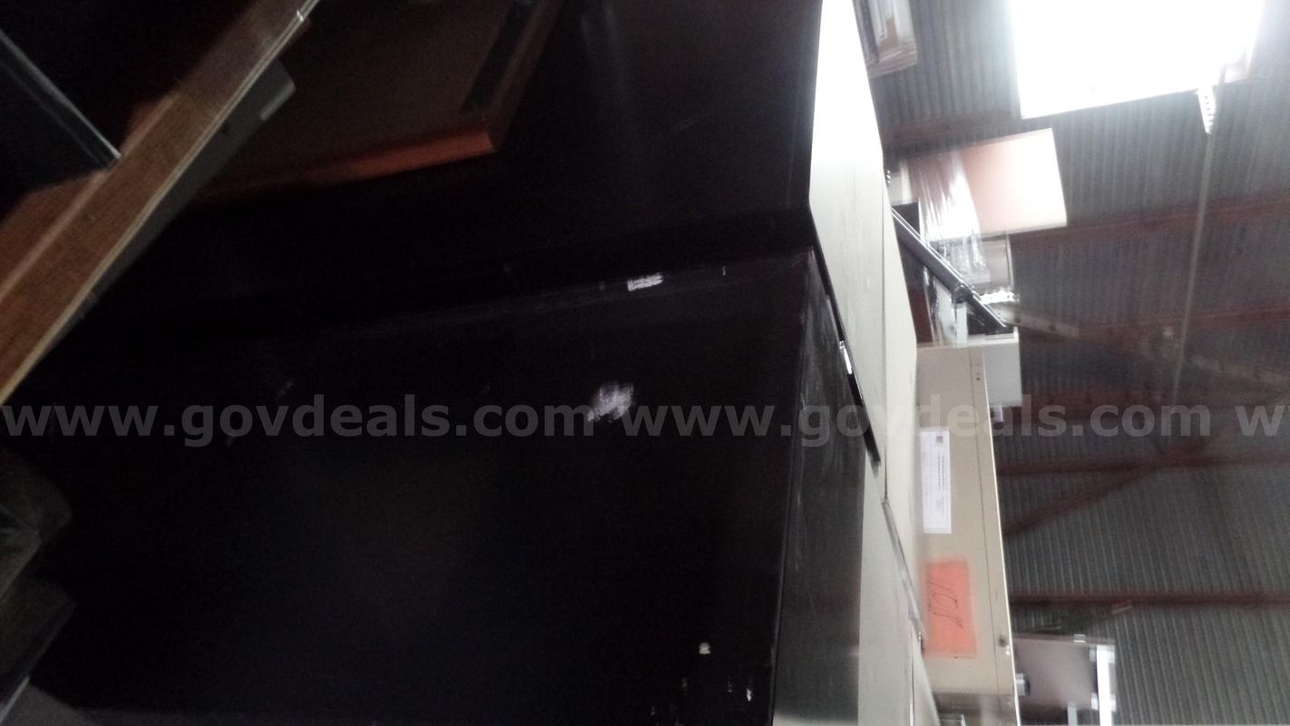 2 black and 3 cream colored filing cabinets, 1 trashcan