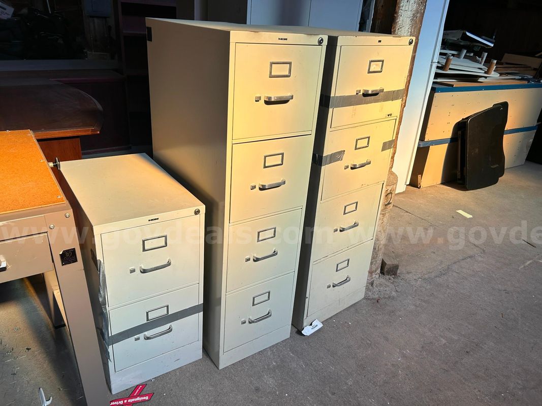 2 four drawer file cabinets, 1 two drawer file cabinet