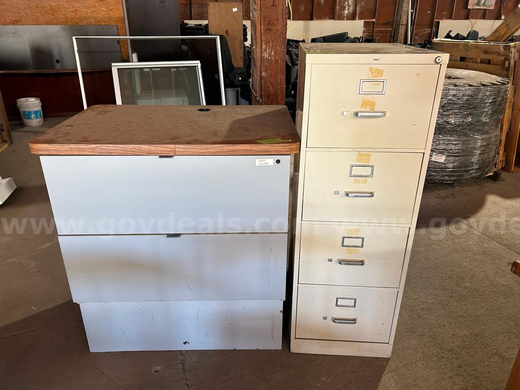 one 4 drawer metal file cabinet, one 2 drawer wood file cabinet lot 25