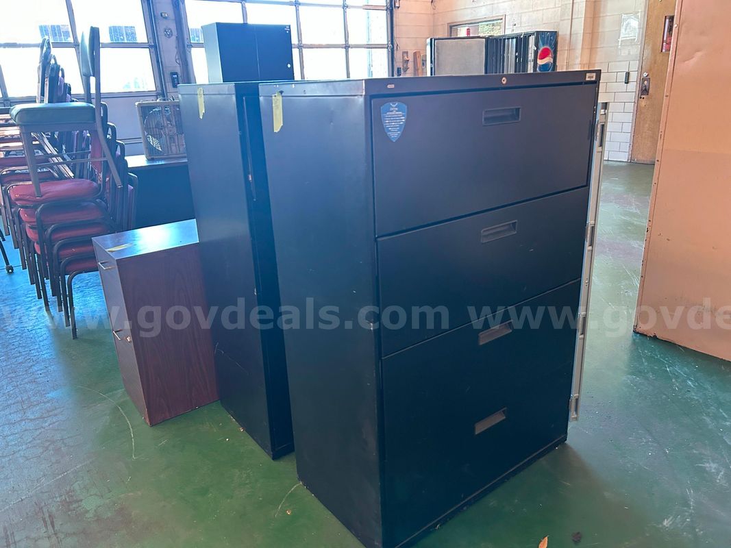 3 = 4 drawer lateral file cabinet, 1 = 2 drawer file cabinet, 1 = 2 door storage cabinet lot 24