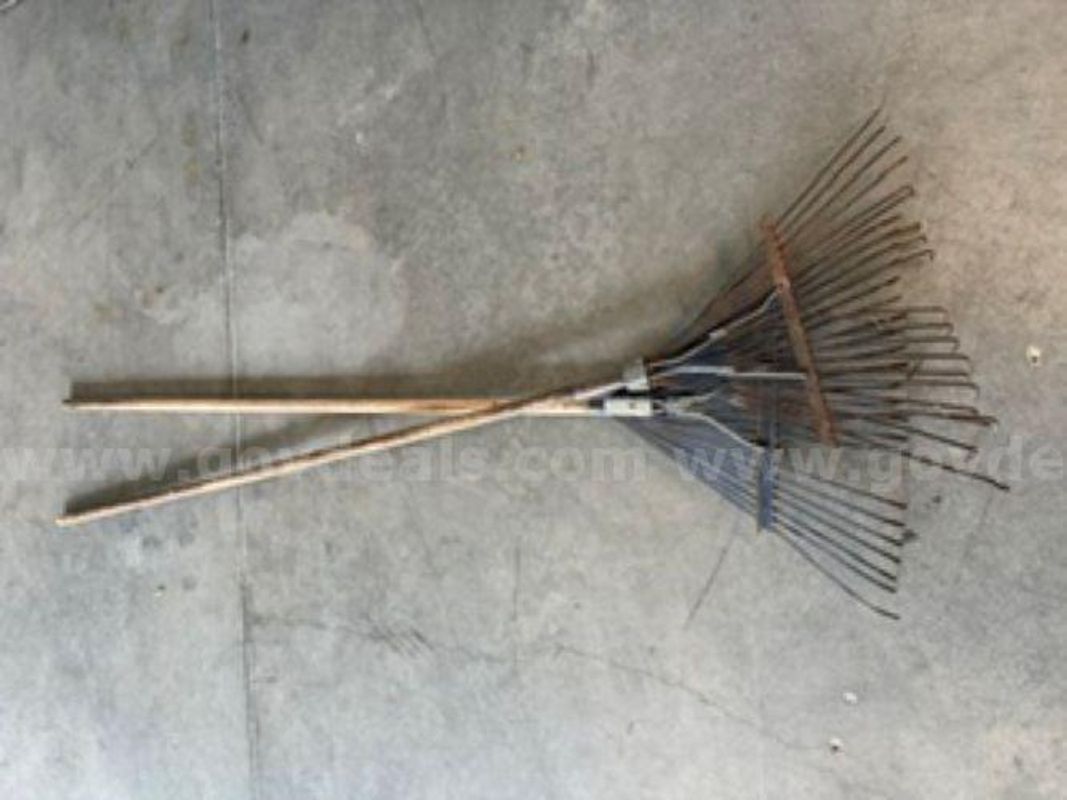 Two used fire rakes