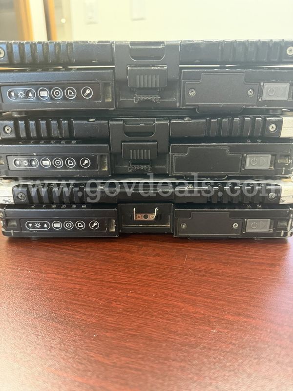 LOT- 3 used tough books, 6 extra computer pens and 2 Ipads