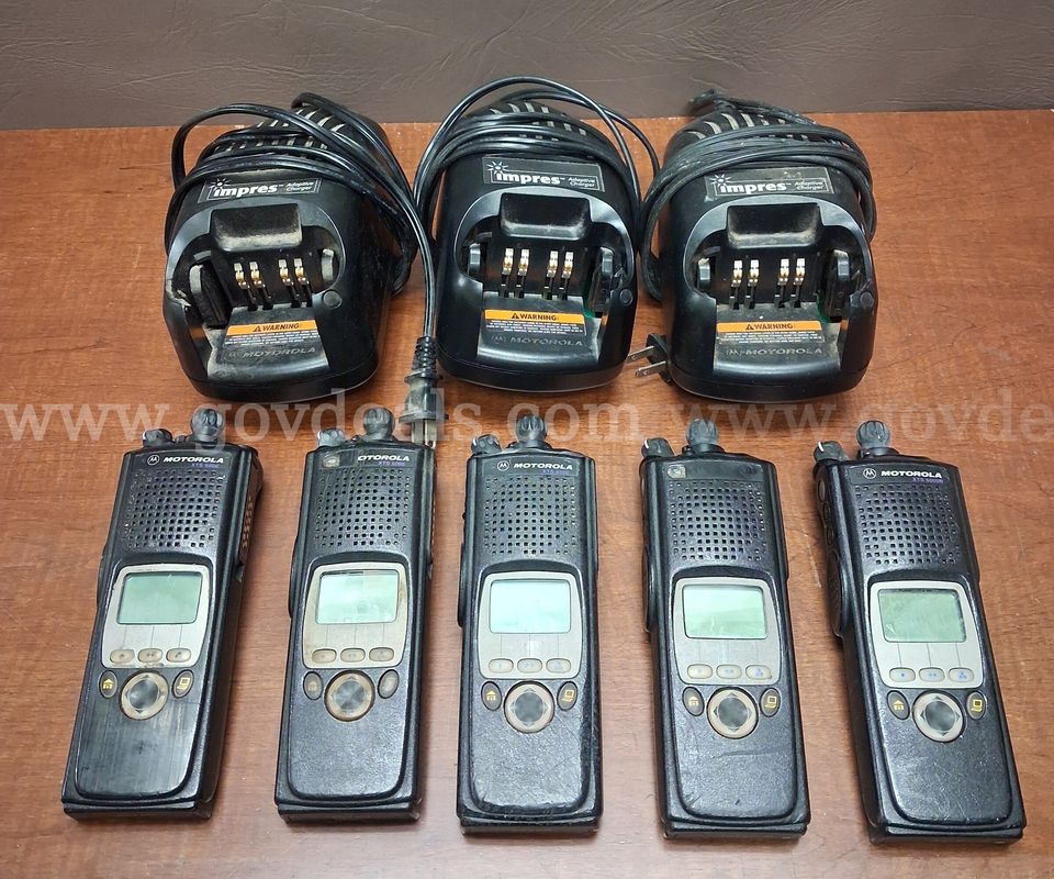 5 Motorola XTS 5000 Radios and 3 Impres Chargers but no Batteries/PRE-OWNED/DS18612/99605/DSP