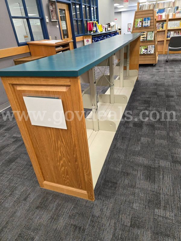 metal shelving unit with laminated top, wood side panels