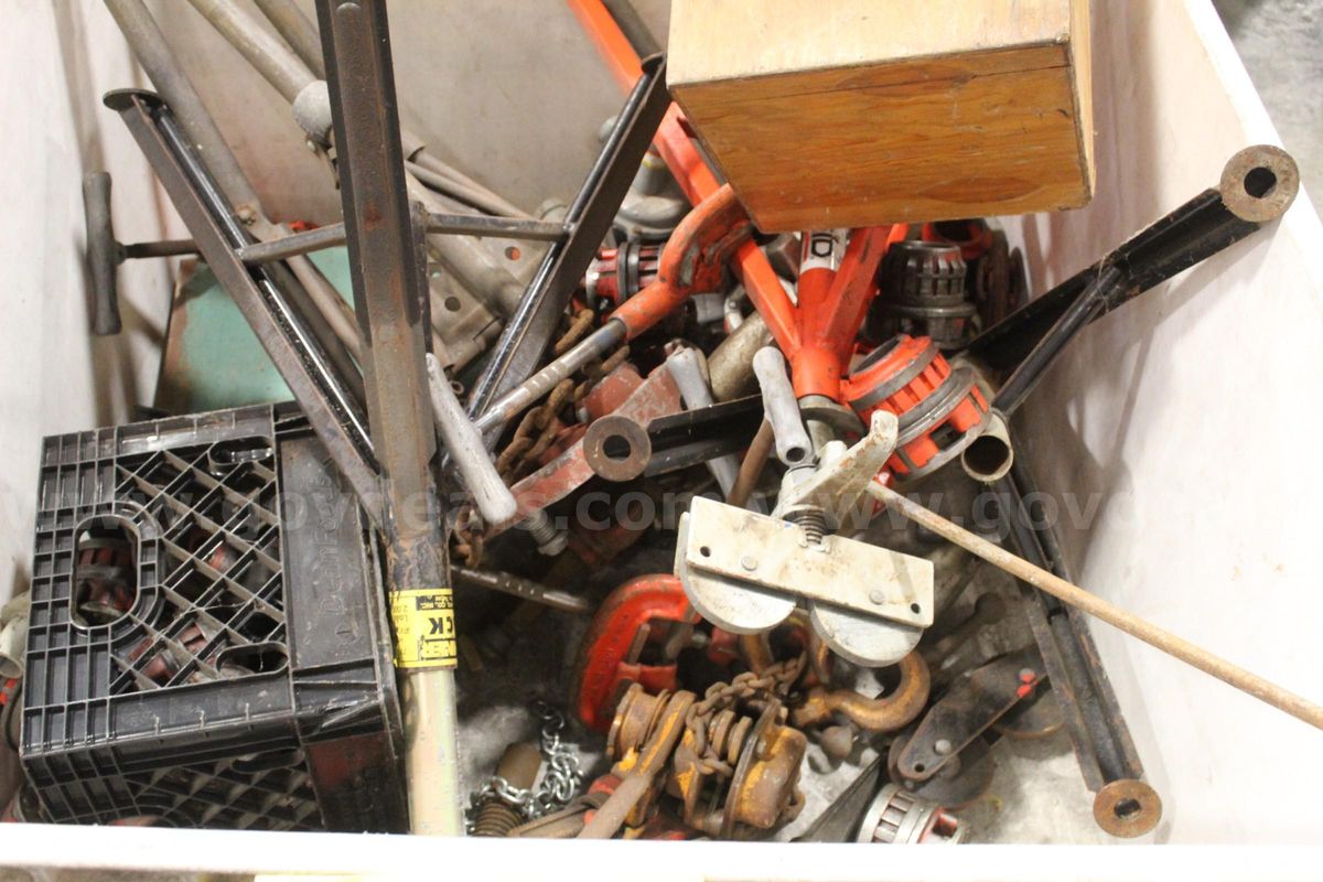 assorted pipe stands and cutters