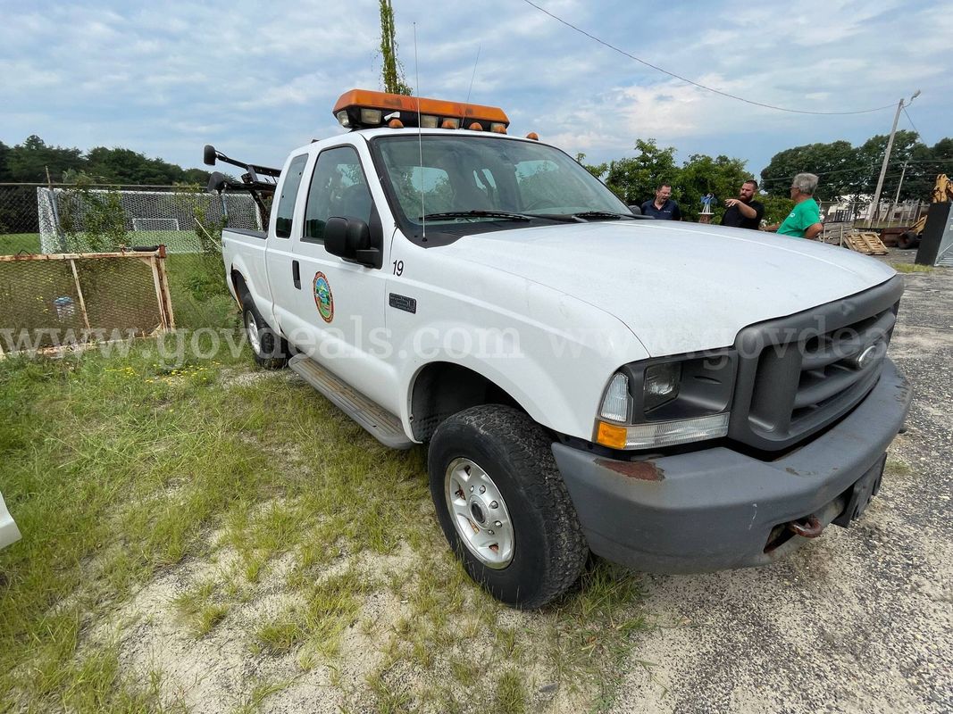 2004 Ford F-250 Super Duty XL SuperCab 4x4 Pickup with Two Snow Plows