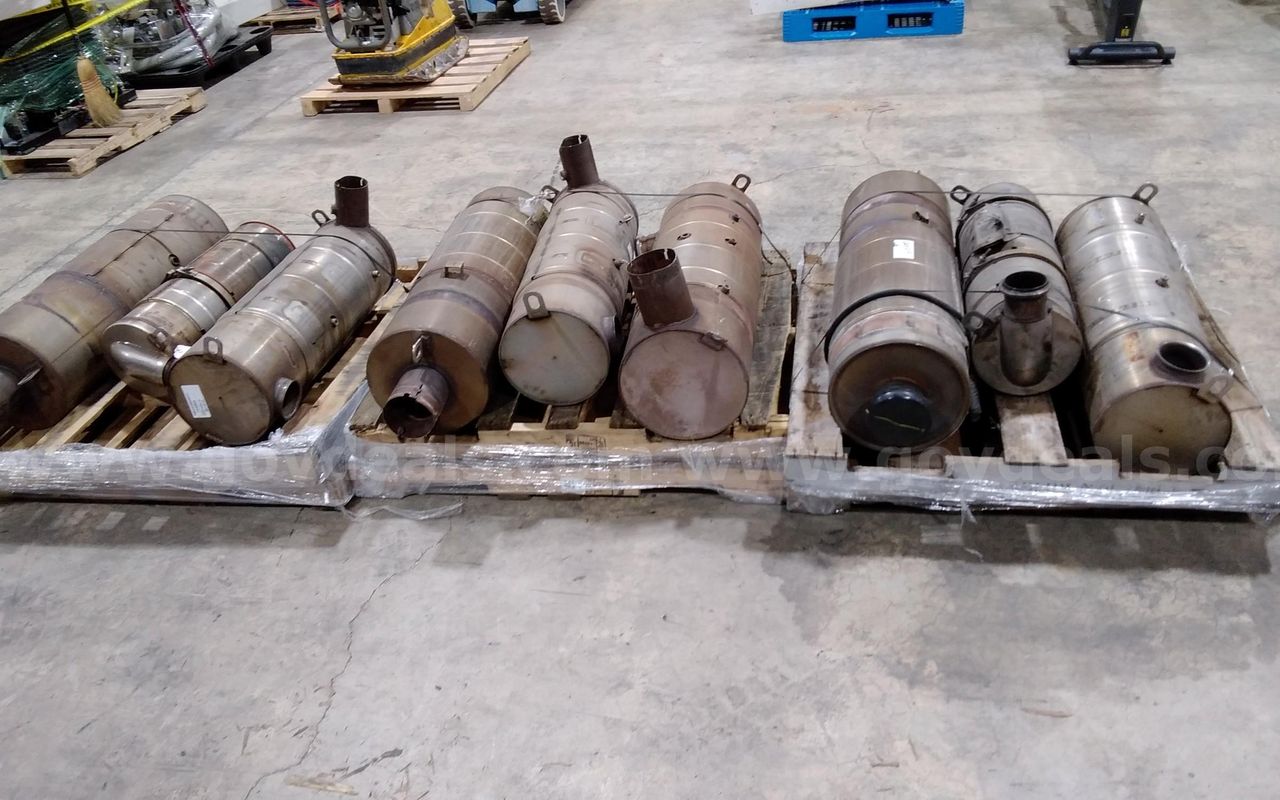 Lot of used miscellaneous bus catalytic converters.