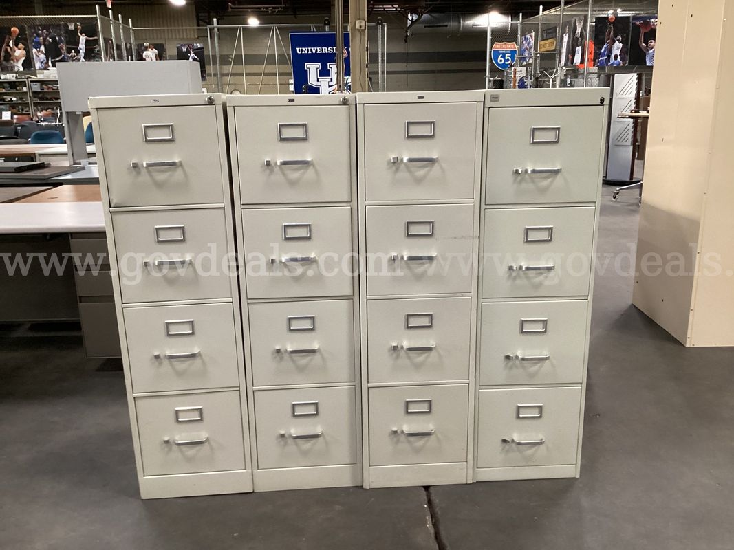 4 - 4 Drawer Filing Cabinets.