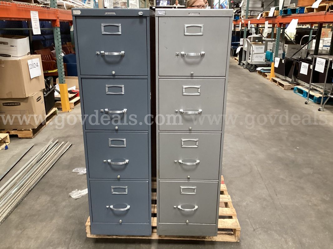 4 - 4 Drawer Filing Cabinets.