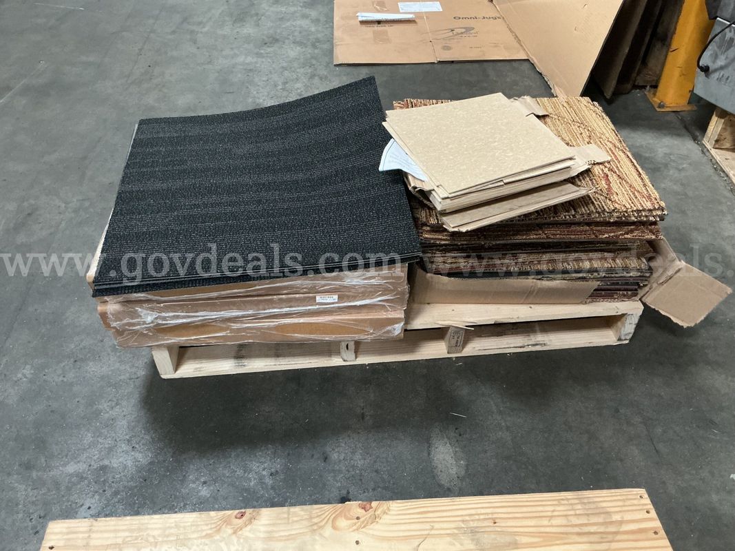 Pallet of Carpet Squares and Vinyl Tiles
