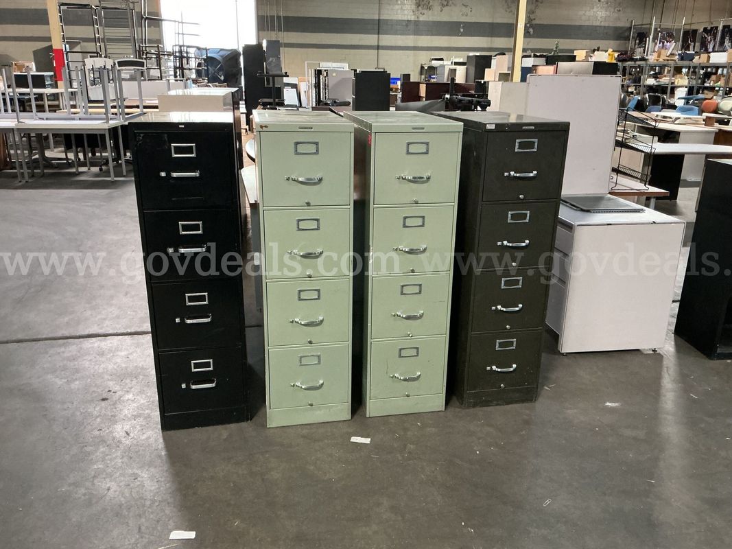 4 - 4 Drawer Filing Cabinets.