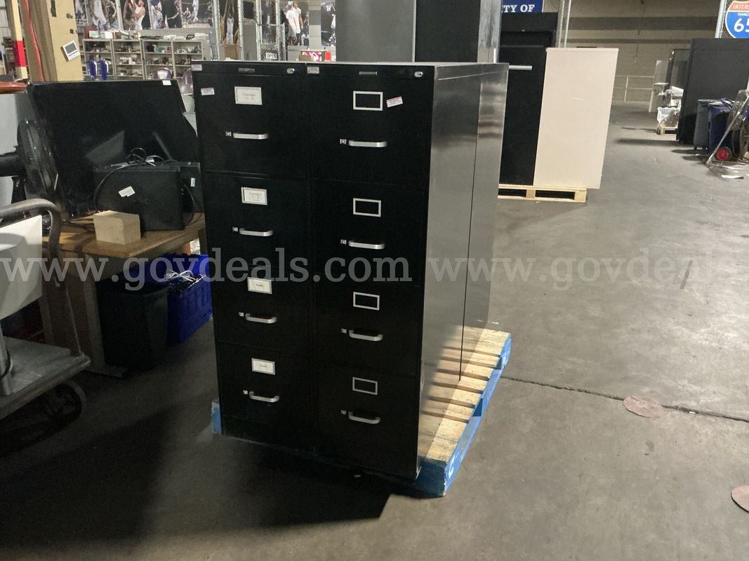 4 - 4 Drawer Filing Cabinets.
