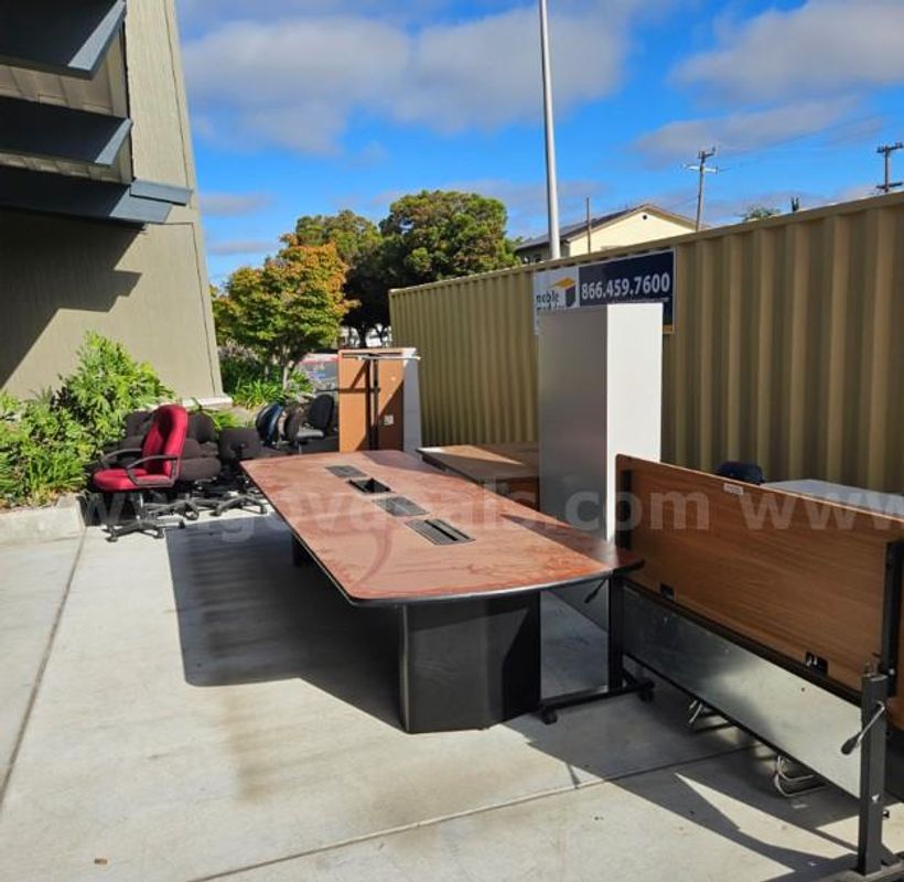 Conference Table (1 Unit) and Chairs (10 Units)