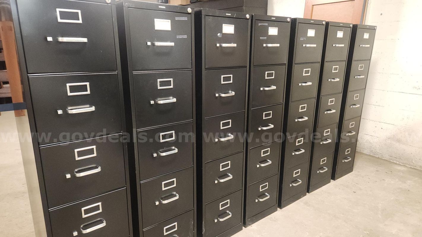 Set of 7 HON filing cabinets with keys