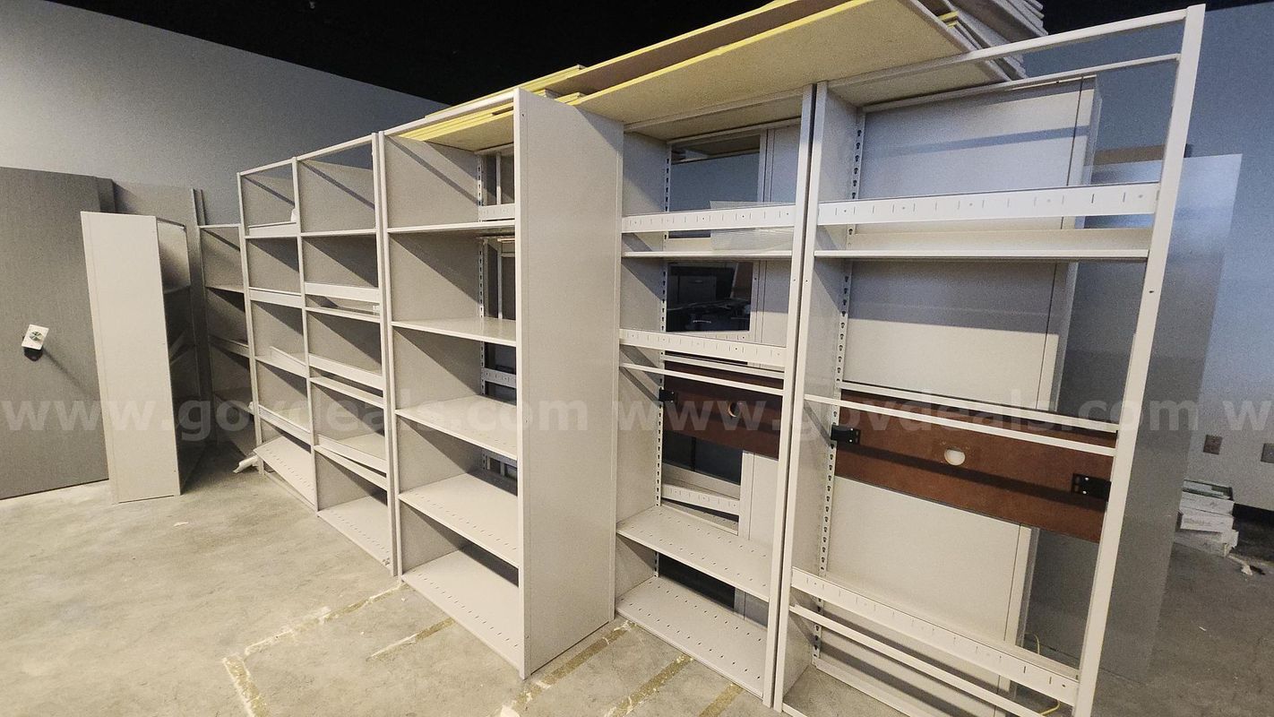 (18) Metal shelving units. Freestanding. Excellent condition.
