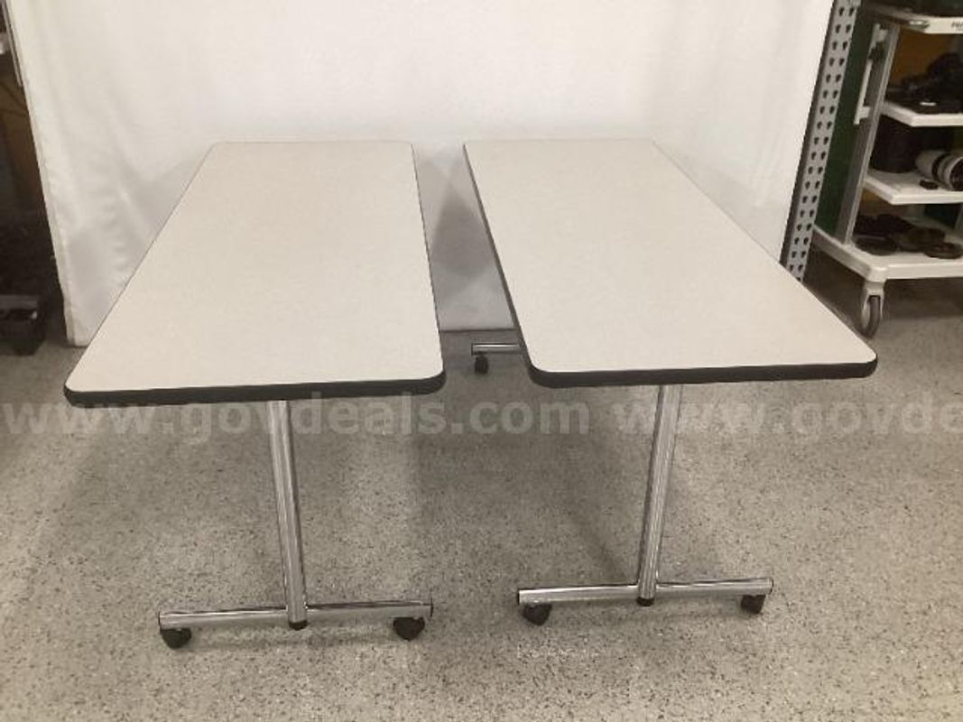 2 Rolling Portico Tables