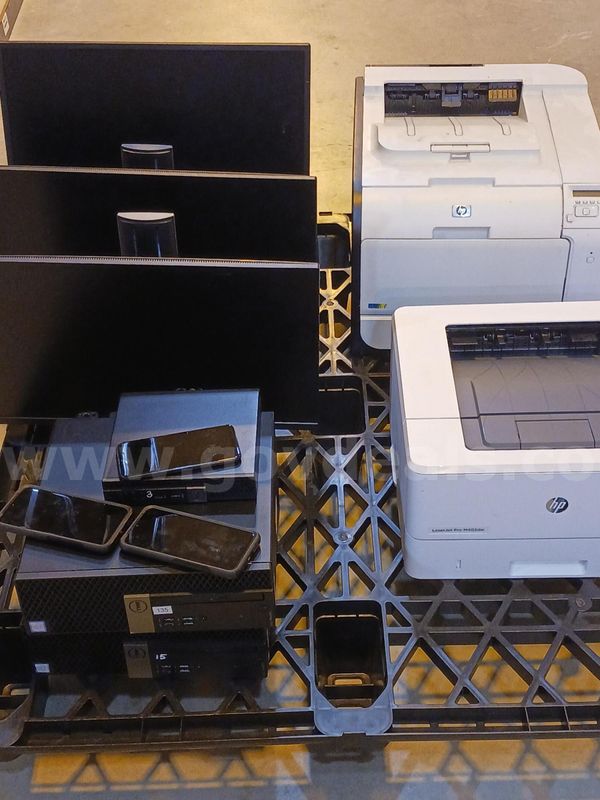 3 desktop computers, 3 monitors, 3 cell phones, 2 printers
