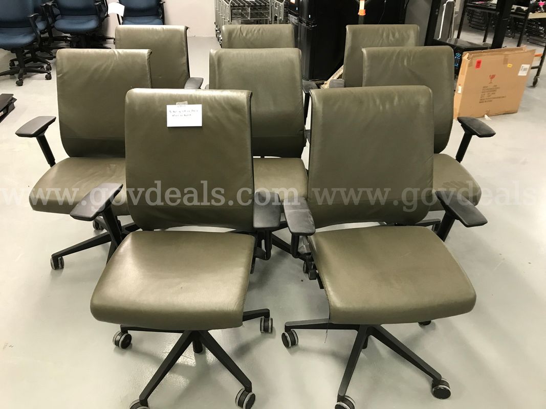 8 Rolling Office Chairs **Tears on Back Corners