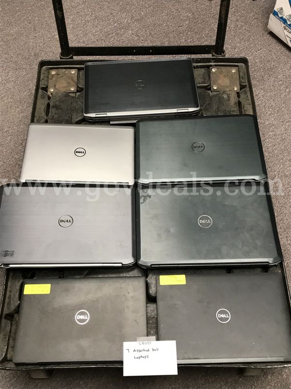 7 Assorted Dell Laptops **1 w/E & S Key Rubbed Off and 1 w/Screen Bleeding