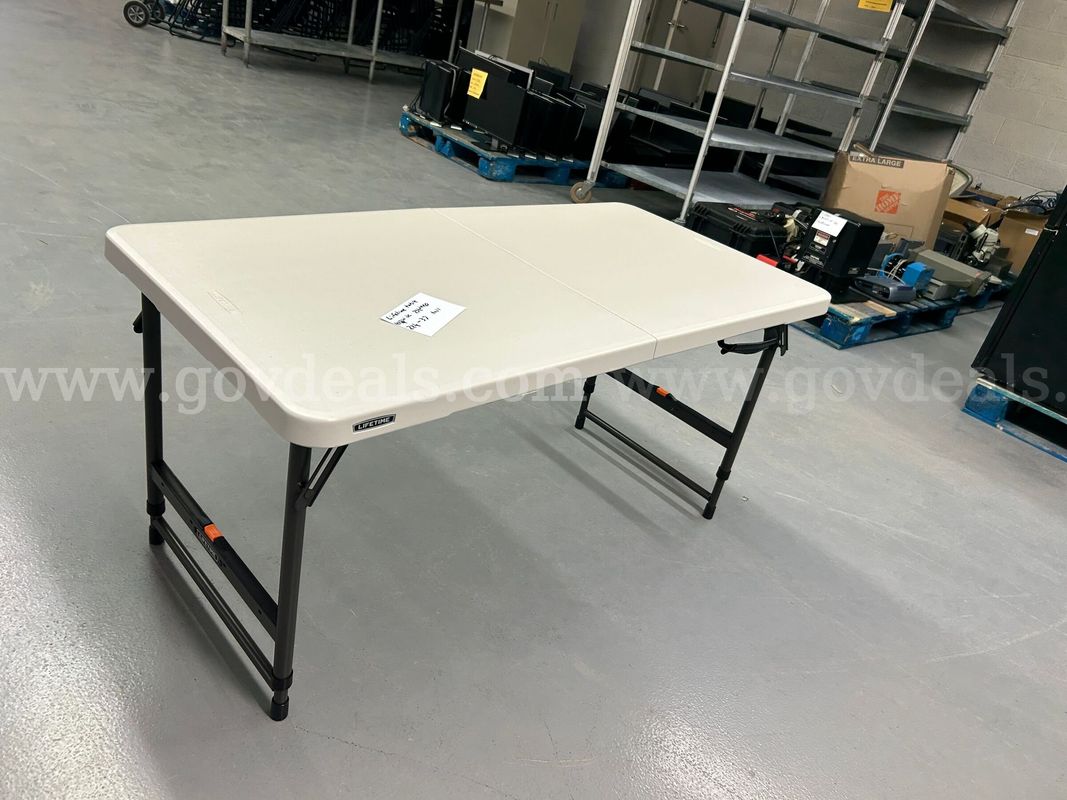 Adjustable Table with folding legs