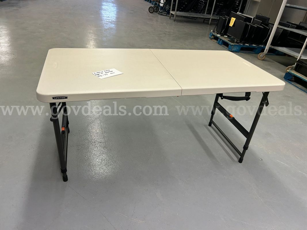 Adjustable Table with folding legs
