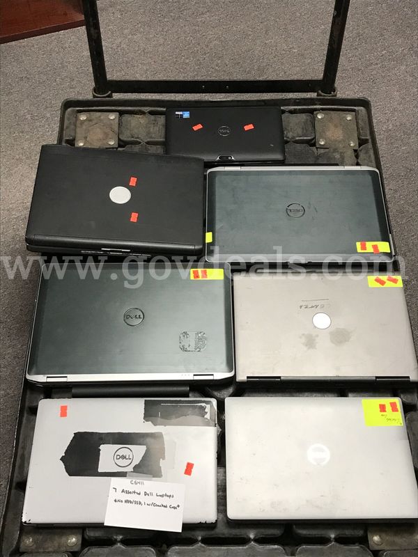 7 Assorted Dell Laptops **NO HDD/SSD, 1 w/Cracked Case