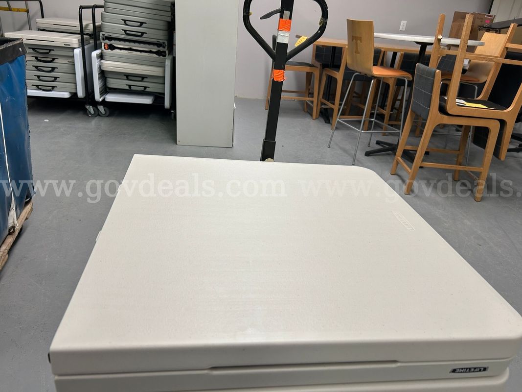 Adjustable Table with folding legs