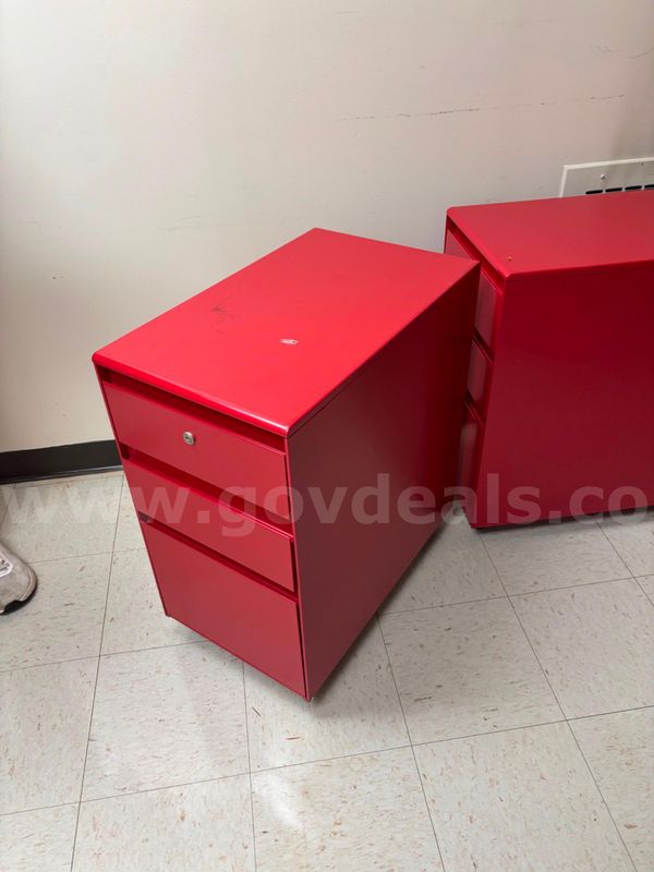 Two metal rolling storage drawers