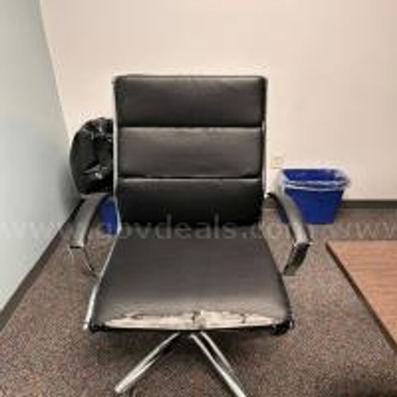 used black and chrome office chairs