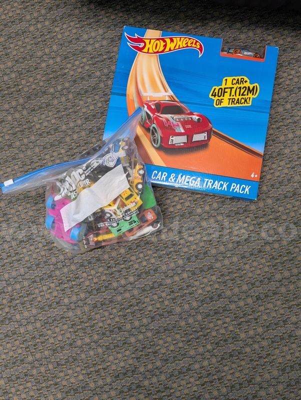 Cars and hot wheels new mega track pack