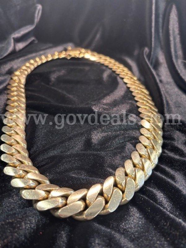 28.5” Long 10k Yellow Gold Cuban Link weighing 800.1 grams