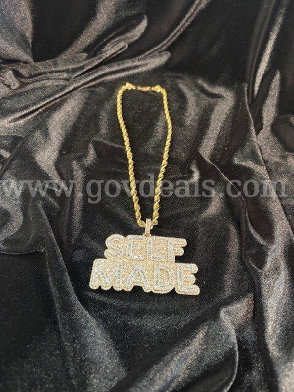 Custom 14k Yellow Gold &14K White Gold Pendant including 10k Gold Rope Chain weighing 113.2 grams
