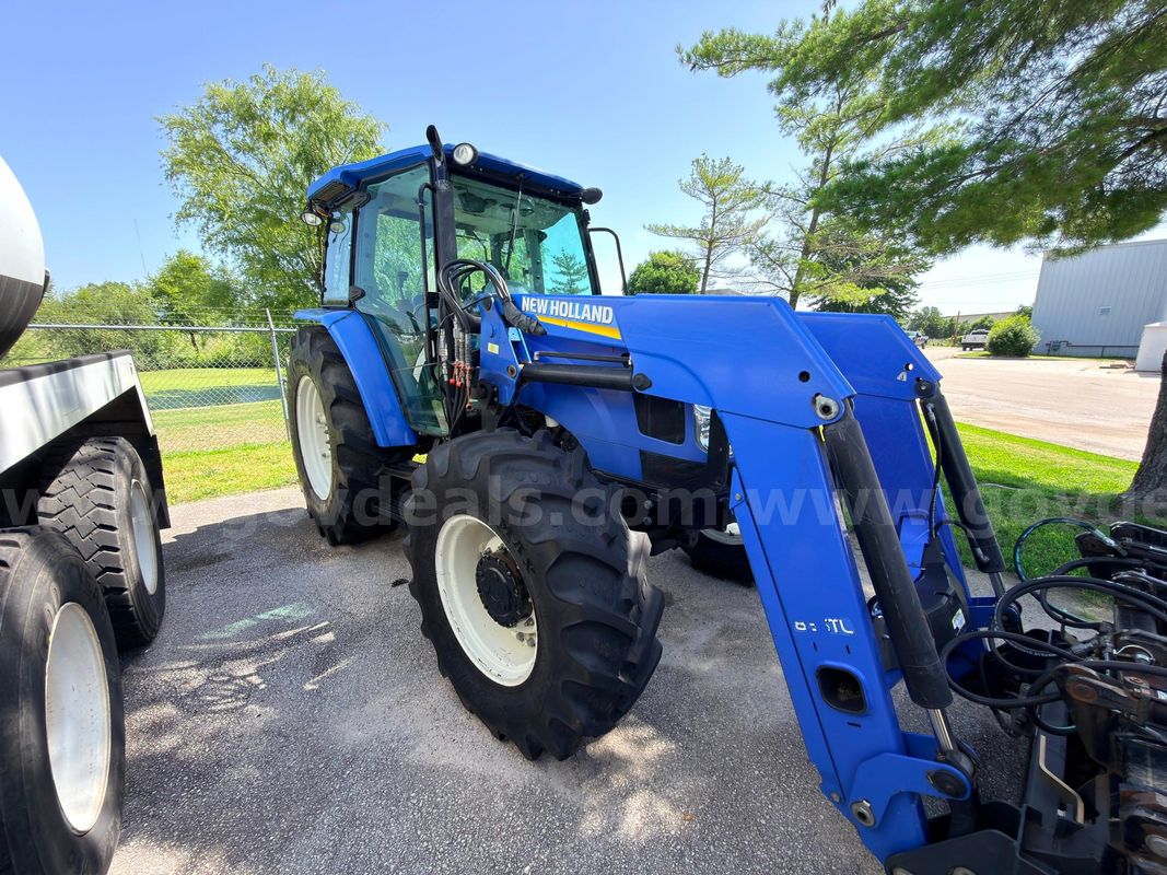 New Holland T5070 Tractor w/Loader and Grapple, w/Cab A/C and Heat