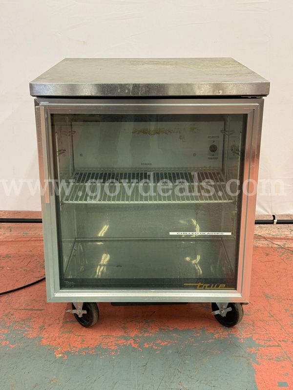 True Undercounter Refrigerator with Shelfs on Wheels, Model: TUC-27G, Powers On (W) 27.5" x (Depth) 30" x (H) 36"