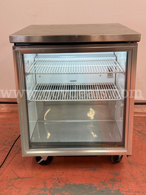 True Undercounter Refrigerator with Shelfs on Wheels, Model: TUC-27G, Powers On (W) 27.5" x (Depth) 30" x (H) 36"